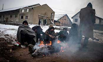 Thousands of refugee children sleeping rough in sub-zero Serbia